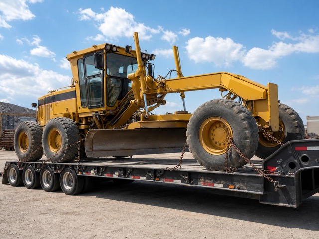 Motor grader transport